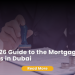 A person in a business suit stamping a legal document next to wooden house models and stacks of coins, with text overlaying the image for a 2026 Dubai mortgage guide.